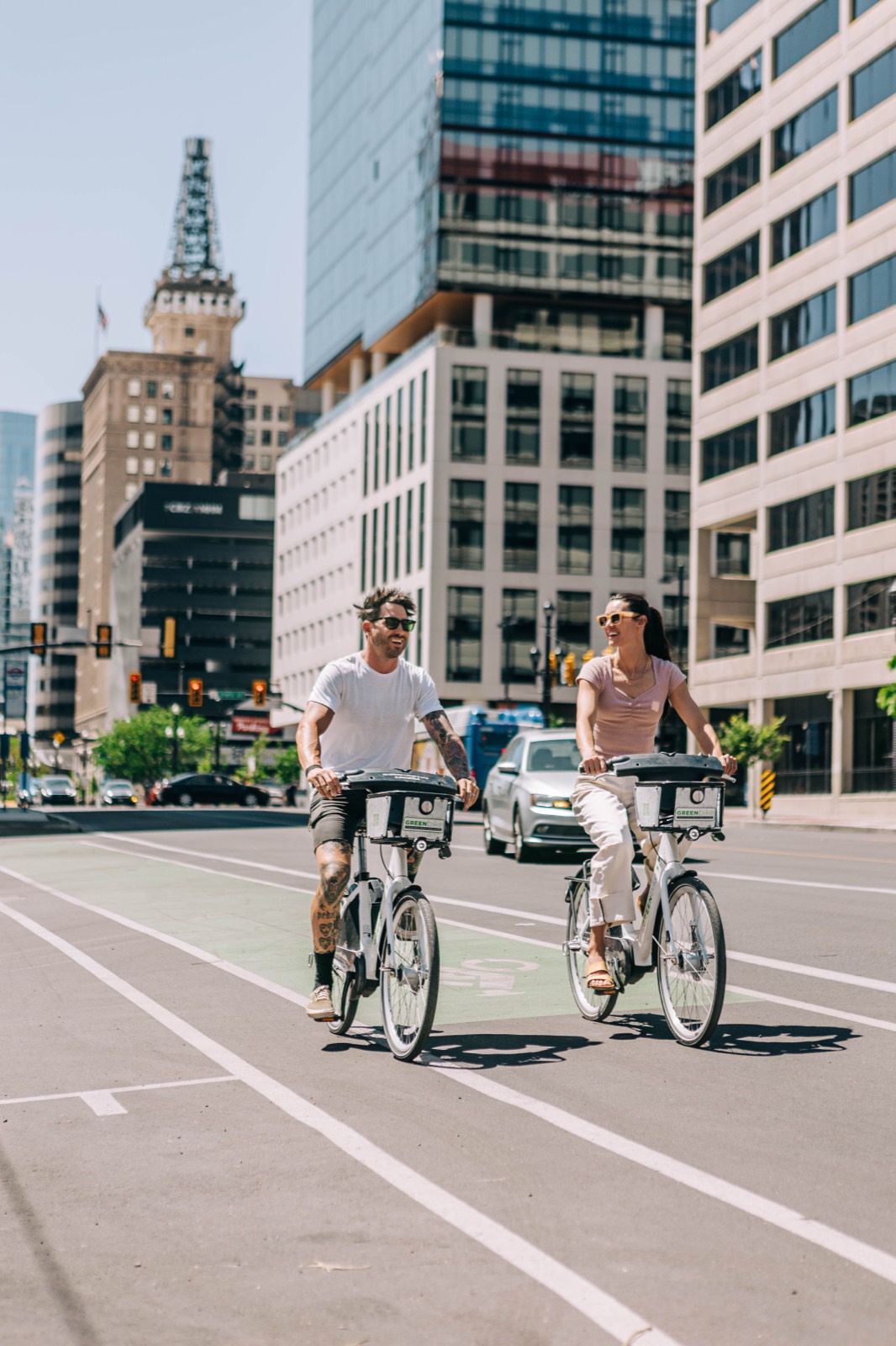 Couple on city bikes in downtown Salt Lake